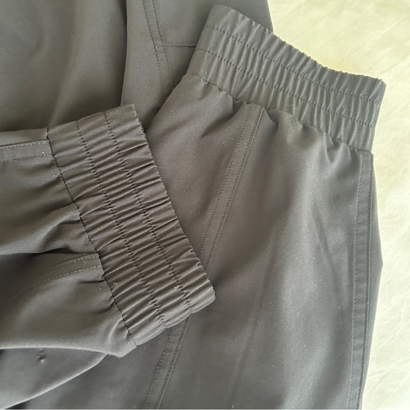 Athleta Unbound Black Jumpsuit Sleeveless Drawstring Waist Pockets size Large - Picture 13 of 15